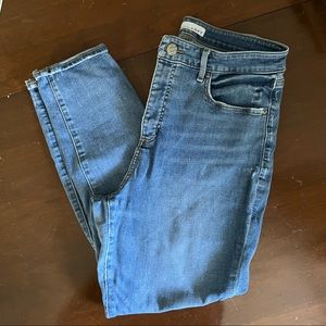 Faded jeans with distressing